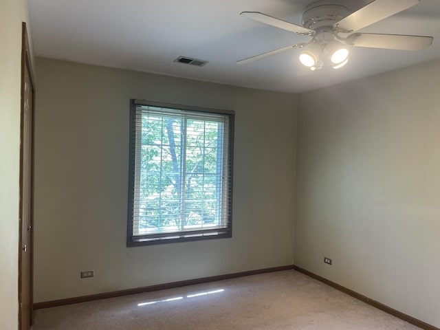216 Charleston Ct Unit 8, Schaumburg, IL 60193 - unfurnished room with healthy amount of natural light, light colored carpet, and ceiling fan