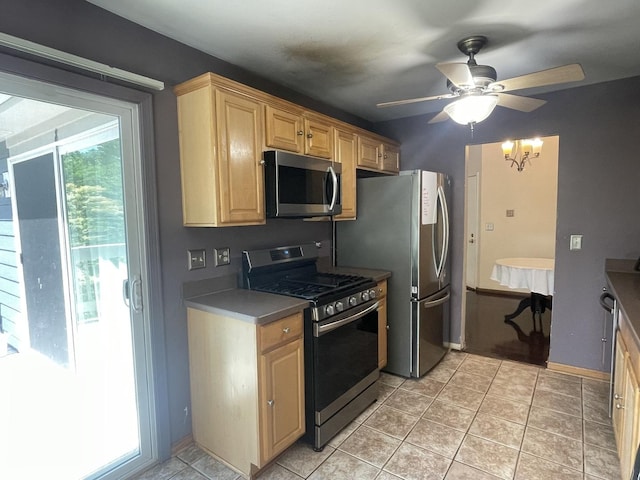 216 Charleston Ct Unit 8, Schaumburg, IL 60193 - kitchen with stainless steel appliances, a ceiling fan, light tile patterned flooring, and light brown cabinetry