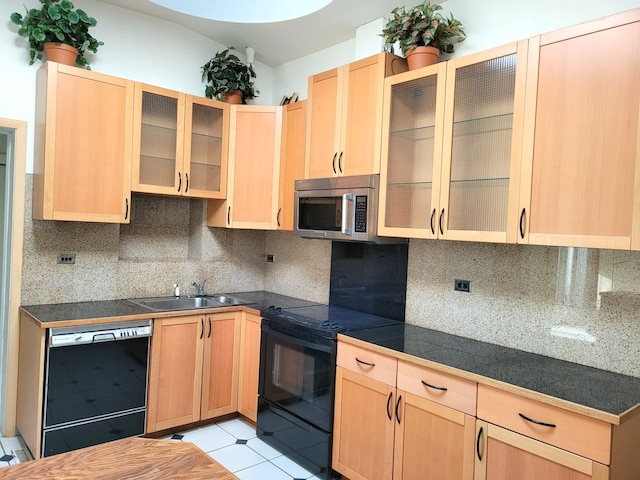 864 Sumac Rd, Highland Park, IL 60035 - kitchen with black appliances, light brown cabinets, backsplash, glass insert cabinets, and lofted ceiling