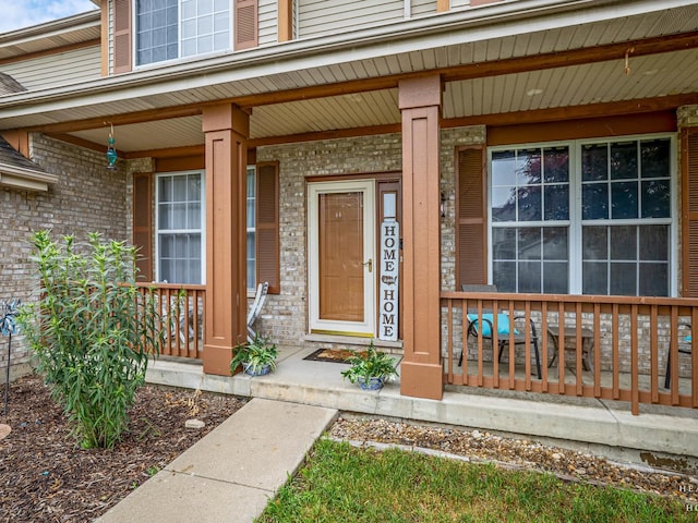 2019 Olde Mill Ln, Mchenry, IL 60050 - entrance to property featuring covered porch and brick siding