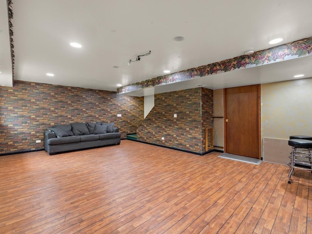 2019 Olde Mill Ln, Mchenry, IL 60050 - living room featuring wood finished floors and brick wall