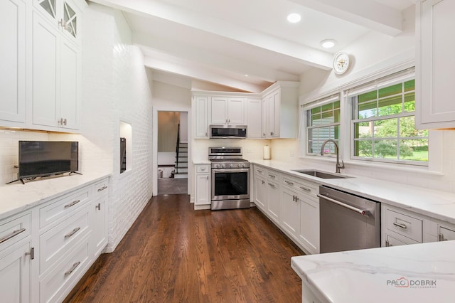 560 Golf Ln, Lake Forest, IL 60045 - kitchen featuring stainless steel appliances, backsplash, white cabinetry, dark wood-type flooring, and recessed lighting