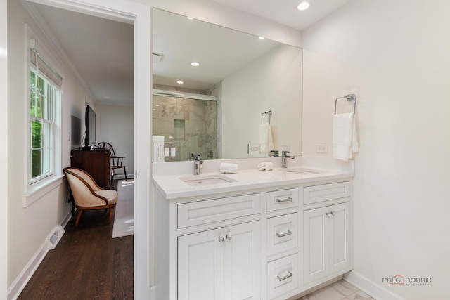 560 Golf Ln, Lake Forest, IL 60045 - full bath with a stall shower, double vanity, recessed lighting, and wood finished floors