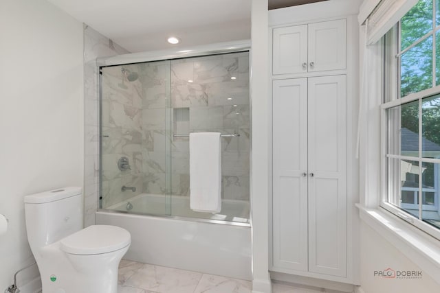 560 Golf Ln, Lake Forest, IL 60045 - bathroom with marble look tiles, combined bath / shower with glass door, and recessed lighting