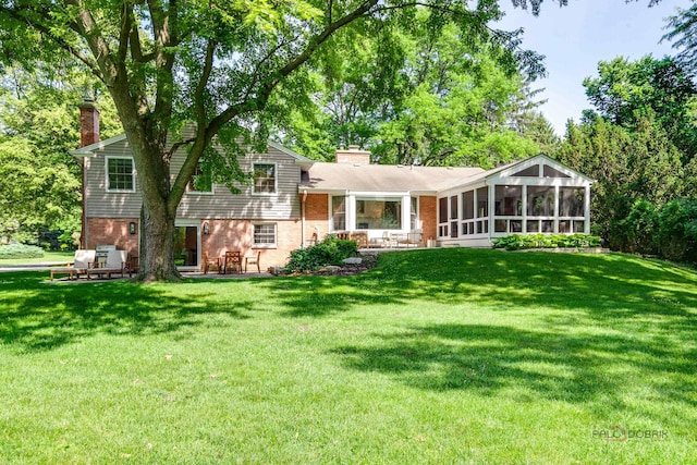 560 Golf Ln, Lake Forest, IL 60045 - back of property featuring a chimney and a yard