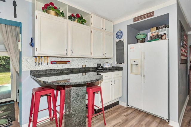 10730 S Ridgeland St, Worth, IL 60482 - kitchen with white fridge with ice dispenser and white cabinetry