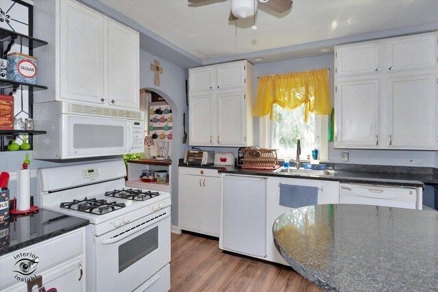 10730 S Ridgeland St, Worth, IL 60482 - kitchen with white appliances, a ceiling fan, white cabinetry, wood finished floors, and arched walkways