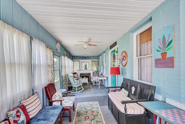 10730 S Ridgeland St, Worth, IL 60482 - sunroom featuring an outdoor hangout area and a ceiling fan