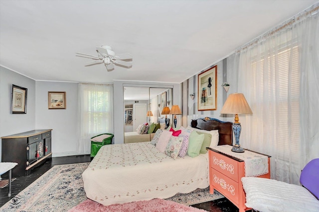 10730 S Ridgeland St, Worth, IL 60482 - bedroom featuring wood finished floors and a ceiling fan