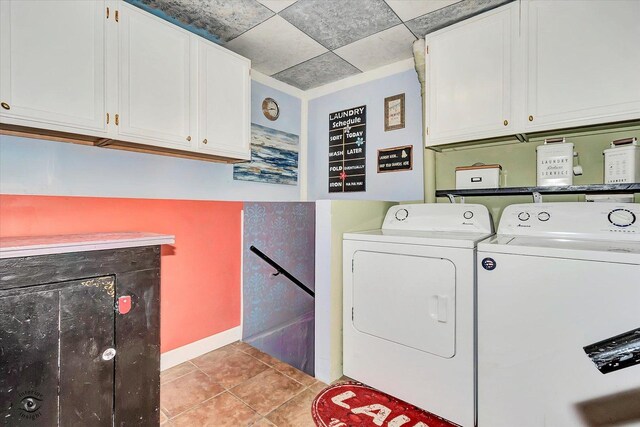 10730 S Ridgeland St, Worth, IL 60482 - laundry room with cabinet space, washer and clothes dryer, and light tile patterned flooring