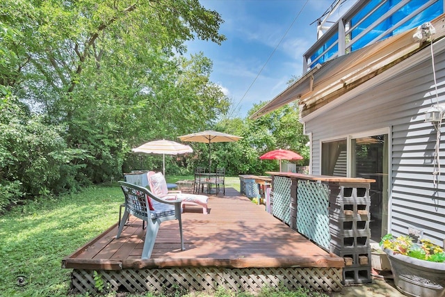 10730 S Ridgeland St, Worth, IL 60482 - wooden deck featuring outdoor dining area and a yard