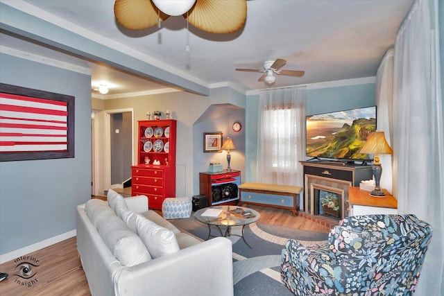 10730 S Ridgeland St, Worth, IL 60482 - living area with ceiling fan, wood finished floors, and ornamental molding