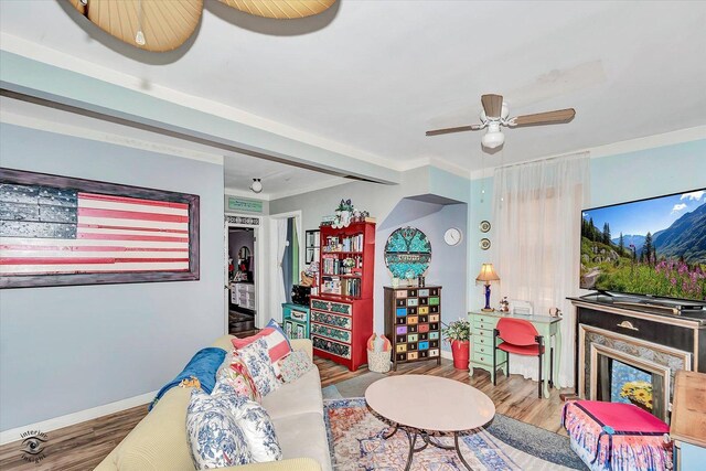 10730 S Ridgeland St, Worth, IL 60482 - living room with wood finished floors, ceiling fan, and ornamental molding