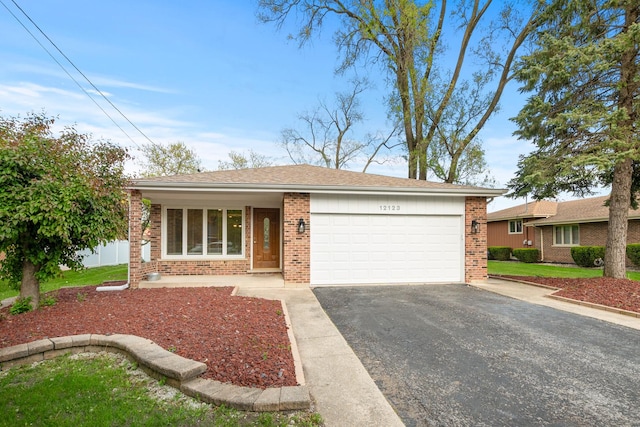 12123 S 72nd Ct, Palos Heights, IL 60463 - ranch-style home featuring brick siding, a garage, and driveway