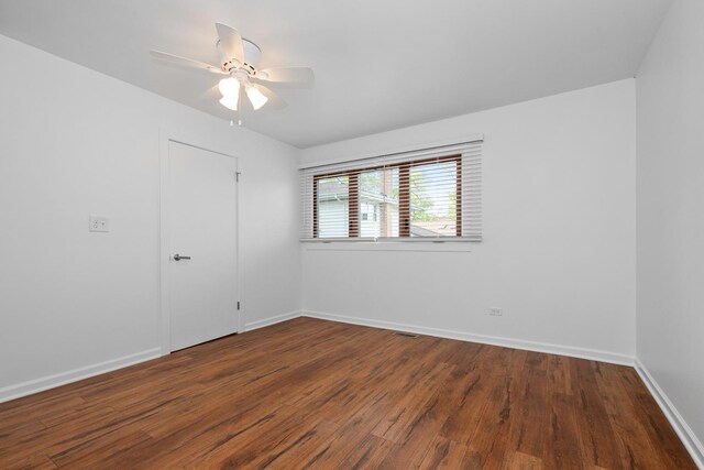 12123 S 72nd Ct, Palos Heights, IL 60463 - empty room with wood finished floors and a ceiling fan