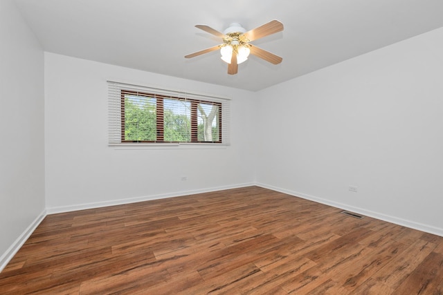 12123 S 72nd Ct, Palos Heights, IL 60463 - spare room with wood finished floors and a ceiling fan