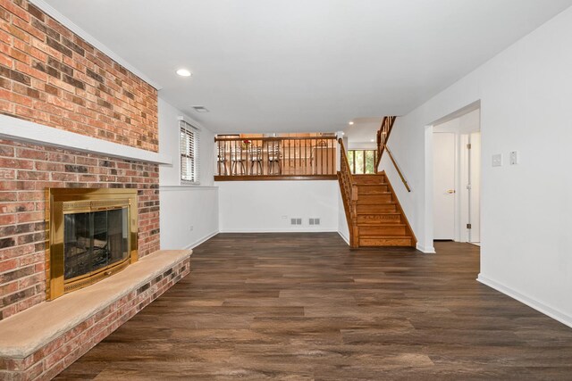12123 S 72nd Ct, Palos Heights, IL 60463 - unfurnished living room with stairs, wood finished floors, a fireplace, and recessed lighting