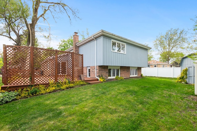 12123 S 72nd Ct, Palos Heights, IL 60463 - back of house featuring board and batten siding and a chimney