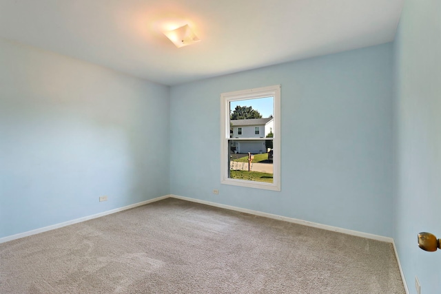 4113 Luckie Ct, Zion, IL 60099 - carpeted empty room featuring baseboards