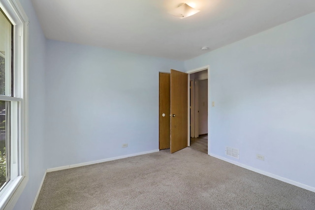 4113 Luckie Ct, Zion, IL 60099 - unfurnished room with carpet and a smoke detector