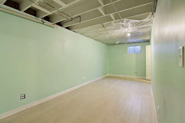 4113 Luckie Ct, Zion, IL 60099 - below grade area featuring wood finished floors and baseboards