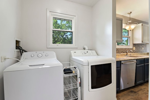 4113 Luckie Ct, Zion, IL 60099 - washroom featuring plenty of natural light, washer and clothes dryer, and dark wood-type flooring