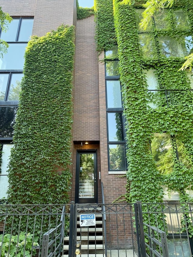 1621 W Le Moyne St Unit 1W, Chicago, IL 60622 - entrance to property with brick siding