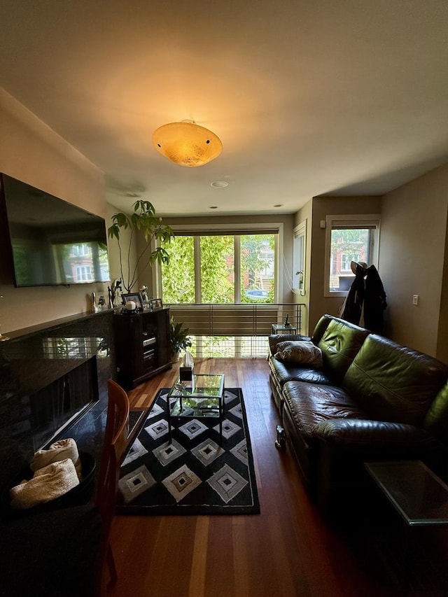 1621 W Le Moyne St Unit 1W, Chicago, IL 60622 - living area featuring dark wood-style flooring and a fireplace
