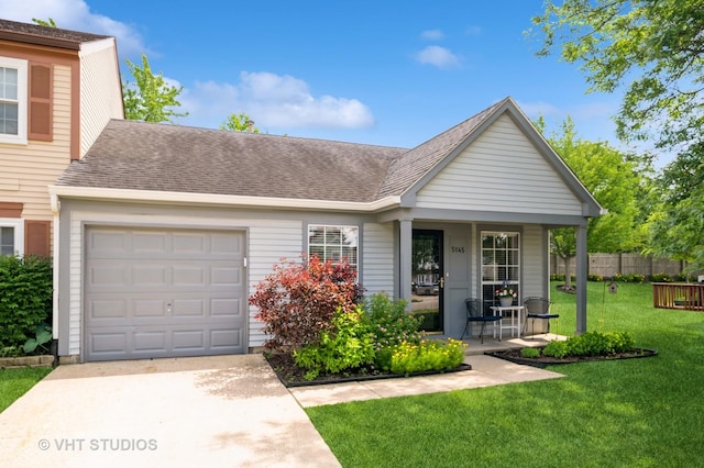 5145 Pembrook Ct, Gurnee, IL 60031 - view of front of home featuring a porch, an attached garage, roof with shingles, and driveway