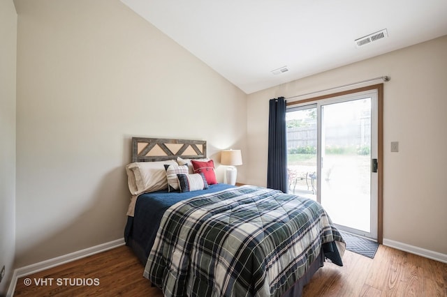5145 Pembrook Ct, Gurnee, IL 60031 - bedroom featuring access to outside, wood finished floors, and lofted ceiling