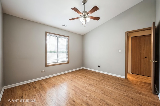 5145 Pembrook Ct, Gurnee, IL 60031 - empty room with lofted ceiling, light wood-style flooring, and a ceiling fan