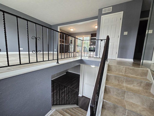423 W Walnut Dr, Streamwood, IL 60107 - staircase with baseboards