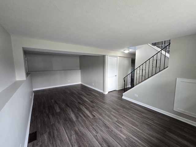 423 W Walnut Dr, Streamwood, IL 60107 - unfurnished living room with dark wood-style floors and stairs