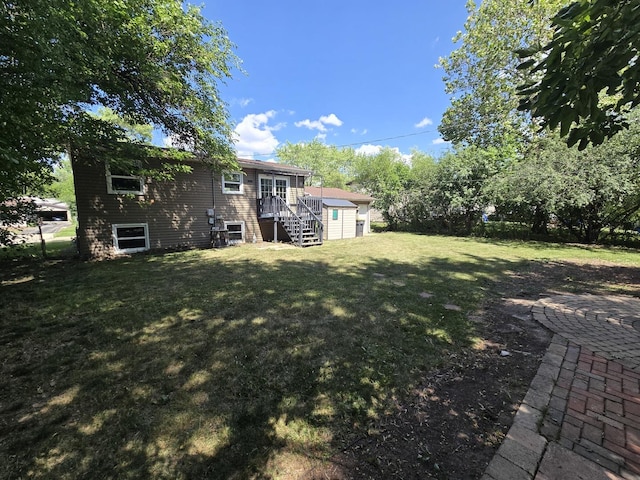 423 W Walnut Dr, Streamwood, IL 60107 - view of grassy yard with an outbuilding