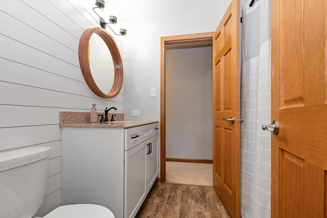 8648 Carriage Ln, Tinley Park, IL 60487 - half bath featuring vanity and wood finished floors
