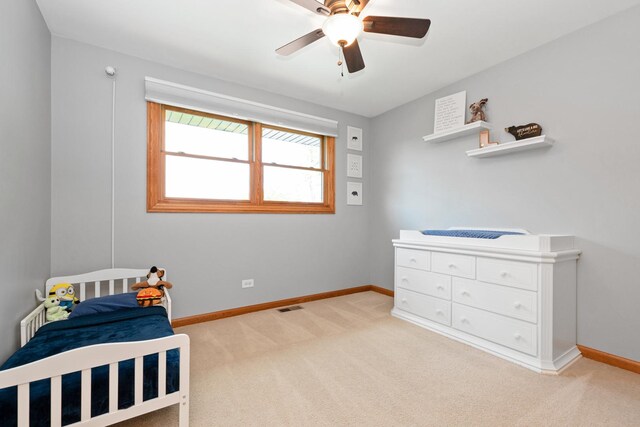 8648 Carriage Ln, Tinley Park, IL 60487 - bedroom with light carpet and ceiling fan