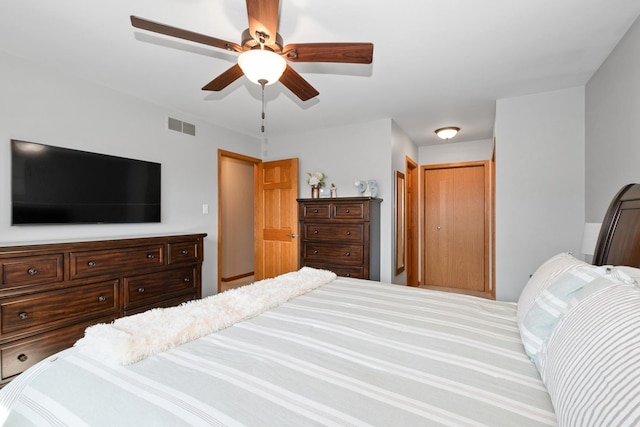 8648 Carriage Ln, Tinley Park, IL 60487 - bedroom with a closet and a ceiling fan