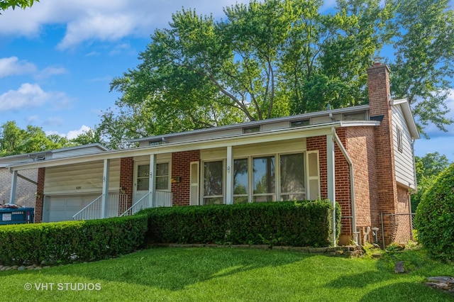 626 Barberry Rd, Highland Park, IL 60035 - view of front of house with brick siding, a front yard, a chimney, and a porch