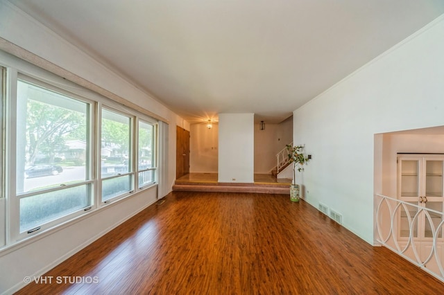626 Barberry Rd, Highland Park, IL 60035 - unfurnished living room featuring wood finished floors and stairs