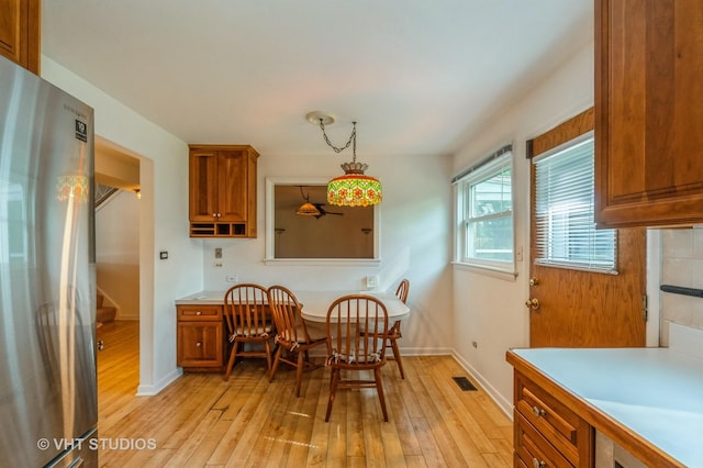 626 Barberry Rd, Highland Park, IL 60035 - dining room with light wood finished floors and stairway
