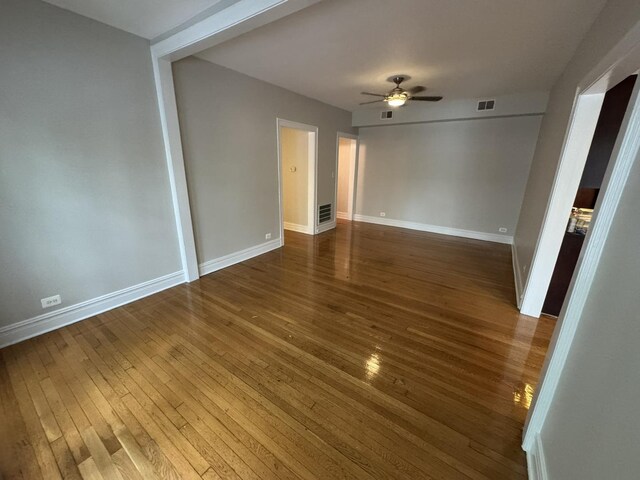 6257 N Sheridan Rd Unit 39, Chicago, IL 60660 - unfurnished room with a ceiling fan and wood-type flooring