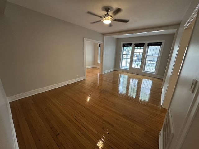 6257 N Sheridan Rd Unit 39, Chicago, IL 60660 - empty room with hardwood / wood-style floors and a ceiling fan