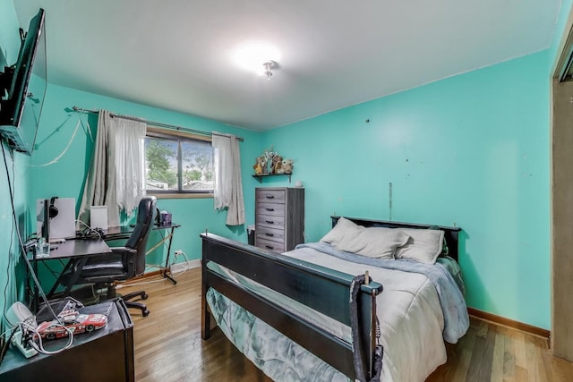 126 Oak Ave, Wood Dale, IL 60191 - bedroom with a desk and wood finished floors