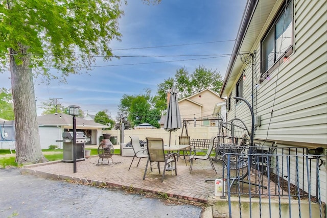 126 Oak Ave, Wood Dale, IL 60191 - view of patio / terrace featuring a grill and outdoor dining area