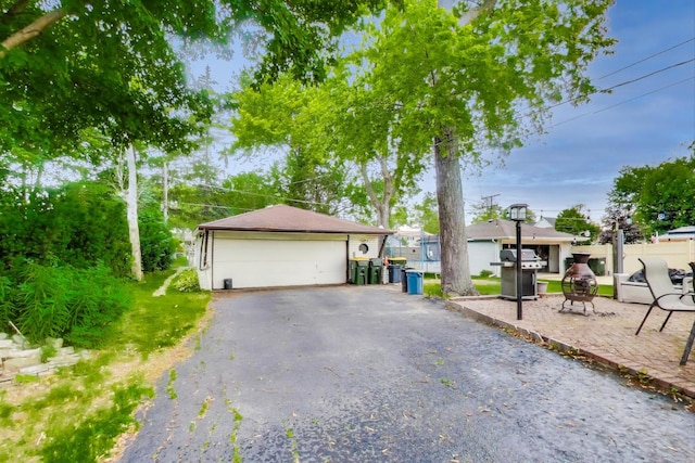 126 Oak Ave, Wood Dale, IL 60191 - ranch-style house featuring a garage and an outdoor structure
