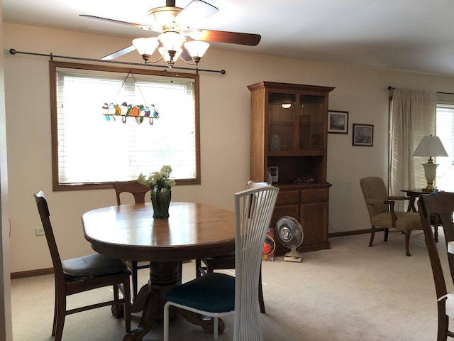 181 Saenz Ln Unit 181, Joliet, IL 60436 - dining room with a ceiling fan and light carpet