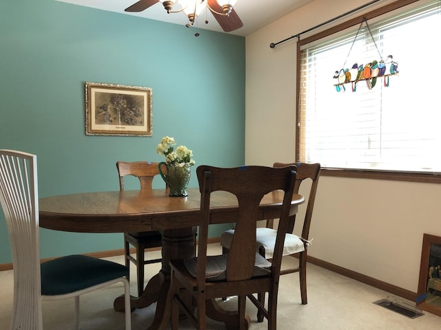 181 Saenz Ln Unit 181, Joliet, IL 60436 - dining area featuring a ceiling fan and light colored carpet