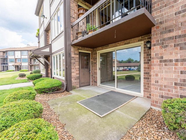 4948 Circle Ct Unit 704, Crestwood, IL 60418 - entrance to property with a balcony and brick siding