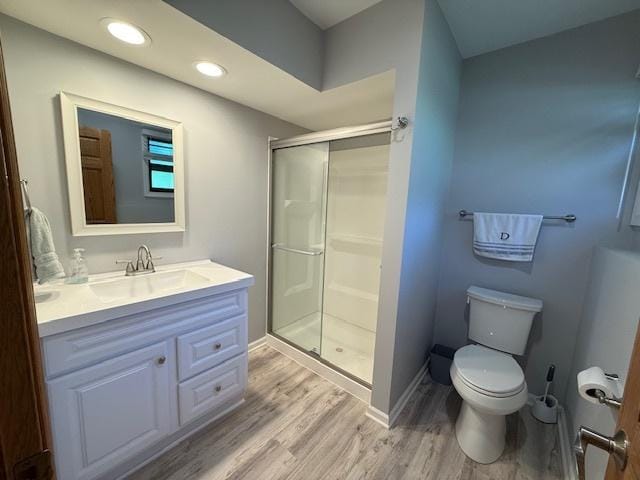 26587 N Cherrywood Ln, Wauconda, IL 60084 - bathroom with wood finished floors, vanity, a stall shower, and recessed lighting