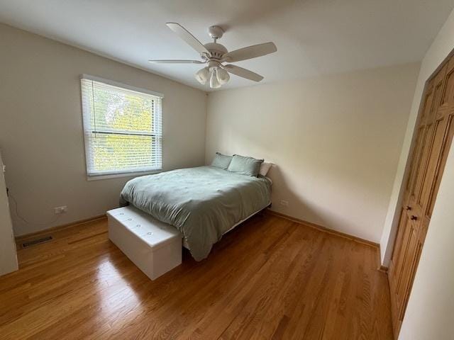 26587 N Cherrywood Ln, Wauconda, IL 60084 - bedroom with light wood-style flooring and ceiling fan